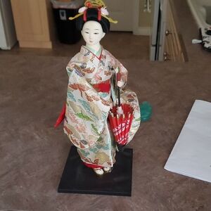 Elegant Japanese Geisha Doll with Red and Gold Kimono